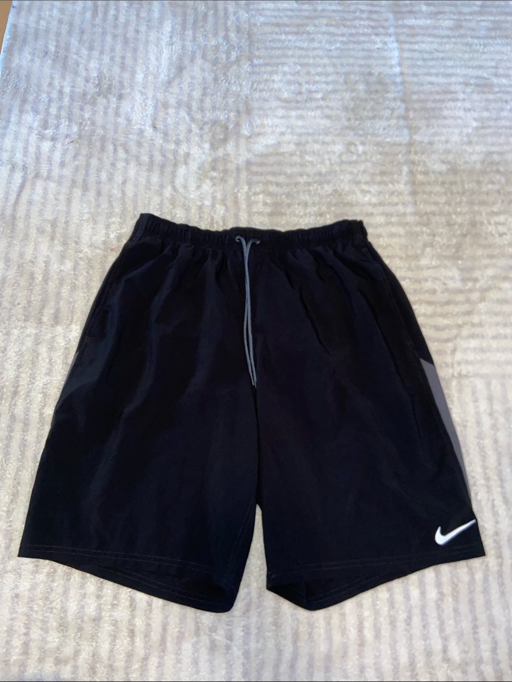 Nike Men’s Black Athletic Shorts with Grey Drawstring and White Swoosh